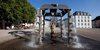 Wasserbrunnen mit Saarbrücker Schloss im Hintergrund